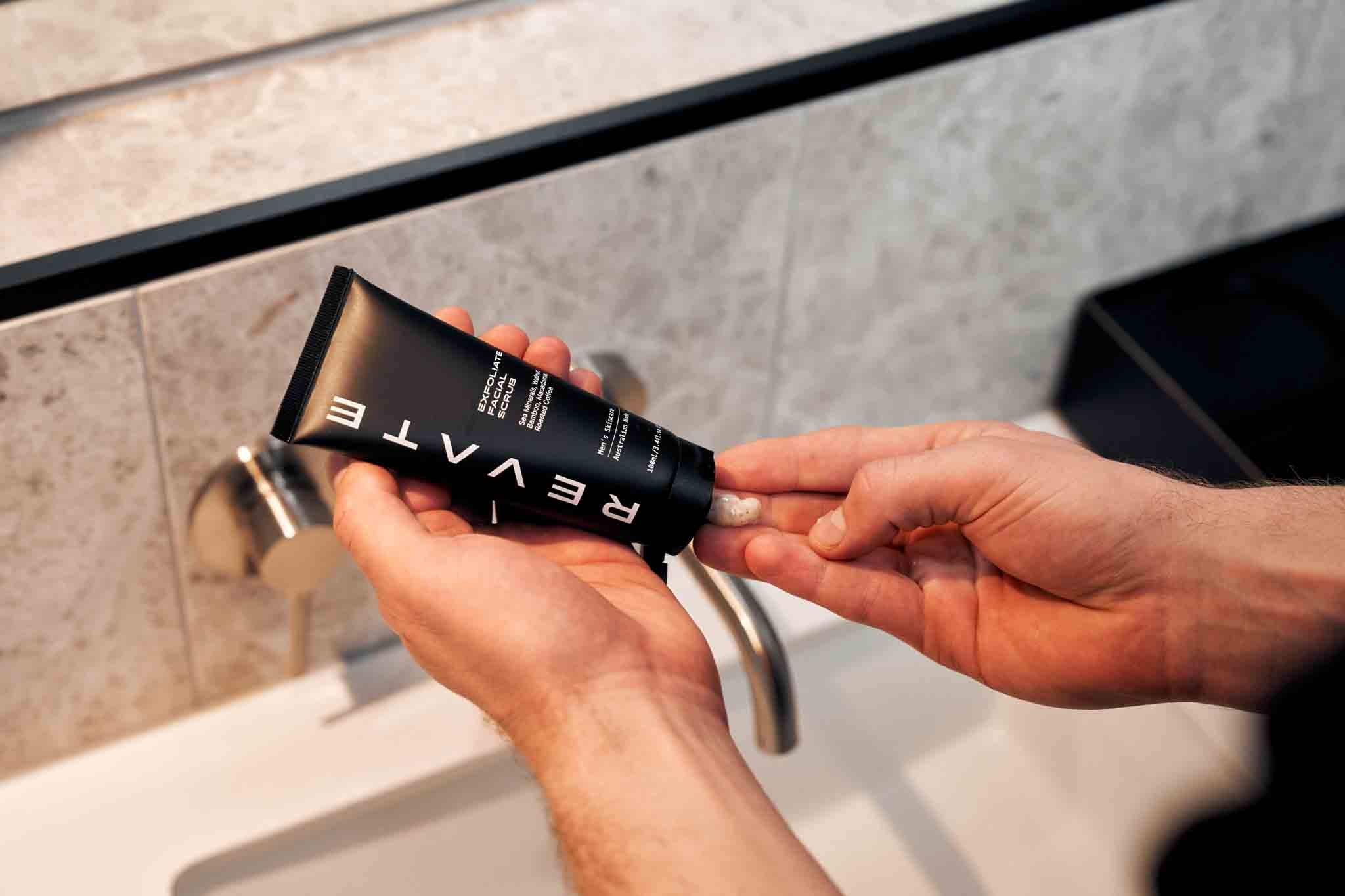 Mens exfoliator scrub applying